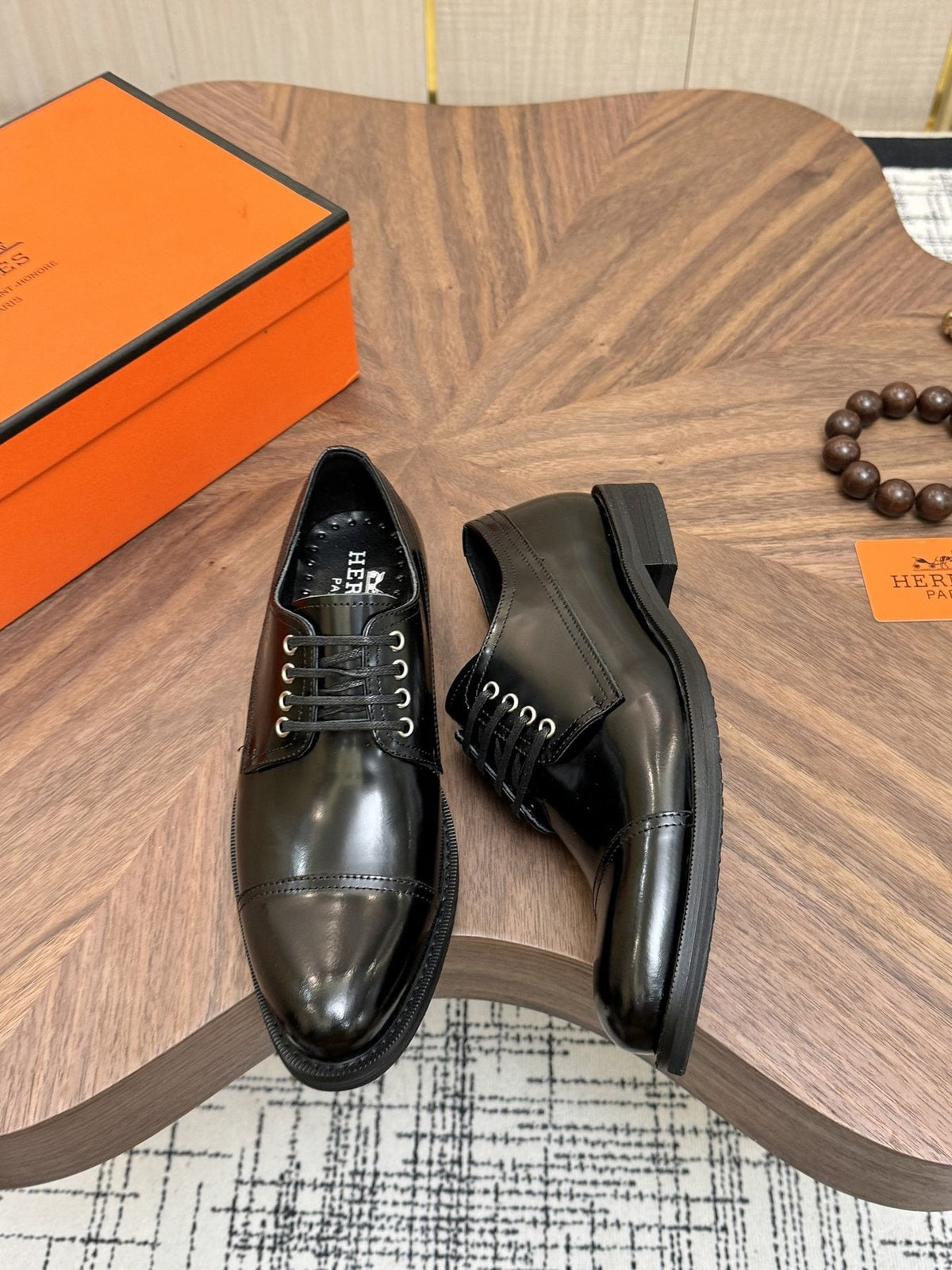 Hermès Polished Leather Lace-Up Dress Shoes — front